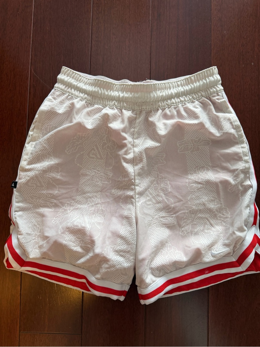 White Nike Athletic Shorts with Red Trim